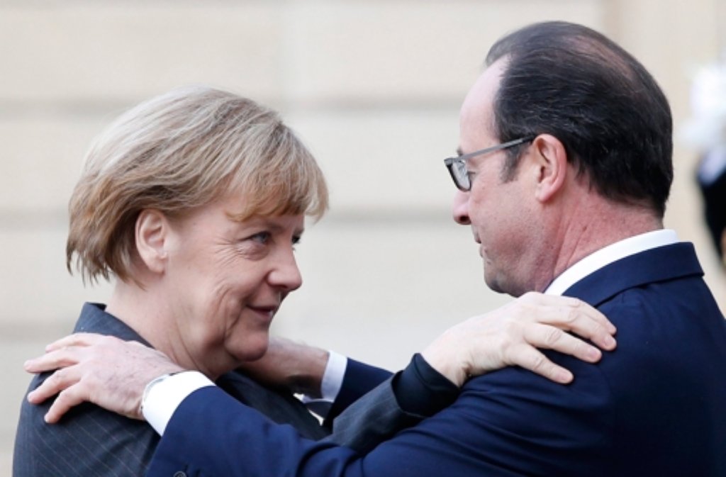 Auch Bundeskanzlerin Angela Merkel (mit Frankreichs Staatspräsident Francois Hollande) nahm am Trauermarsch von Paris teil.