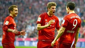 Jubel in Reinform: Die Torschützen des FC Bayern München nach dem Sieg gegen den BVB: Mario Götze, Thomas Müller und Robert Lewandowski (von links). Foto: Getty Images