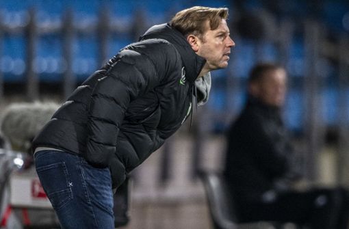 Der VfL Wolfsburg mit Trainer Florian Kohfeldt steckt in der Krise. Foto: dpa/David Inderlied