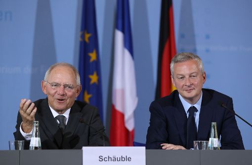 Finanzminister Wolfgang Schäuble und sein neuer französischer Kollege Bruno Le Maire blicken zuversichtlich nach Griechenland. Foto: Getty Images Europe