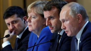 Vier auf der Suche nach der Friedensformel – Wolodymyr Selenskyj, Angela Merkel, Emmanuel Macron und Wladimir Putin in Paris. Foto: AFP