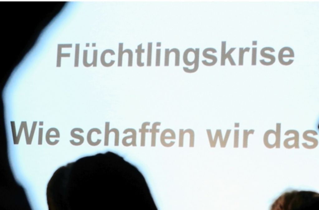„Wie schaffen wir das“: Schriftzug auf der Leinwand einer CDU-Veranstaltung in Sachsen-Anhalt.