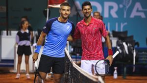 Borna Coric (links) und Novak Djokovic bei der Adria Tour in Zadar. Foto: imago images/Marko Dimic