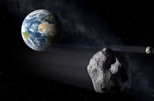 Auf Kollisionskurs: Ein Asteroid rast auf die Erde zu – zum Glück ist diese Illustration Fiktion. Foto: dpa