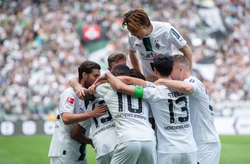 Mönchengladbach freut sich über drei Punkte gegen Wolfsburg. Foto: dpa/Marius Becker