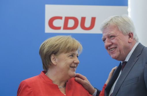 Hält für Merkel den Kopf hin: Hessen-Ministerpräsident Volker Bouffier Foto: AP