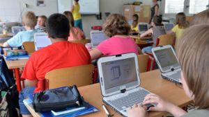 Internet im Klassenzimmer: Dafür fordern die Städte ein Modernisierungsprogramm. Foto: dpa