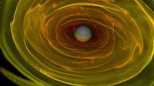 Numerisch-relativistische Simulation zweier einander umkreisender und verschmelzender Neutronensterne. Dargestellt ist das bei der Verschmelzung der beiden Neutronensterne entstandene schwarze Loch und die es umgebende Aggregationsscheibe. Foto: dpa/Max-Planck-Institut für Gravitationsphysik