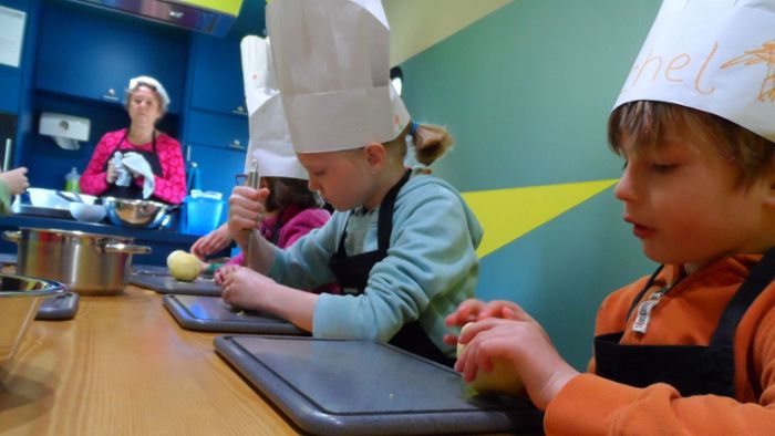 Kinder lernen den Spaß am Kochen
