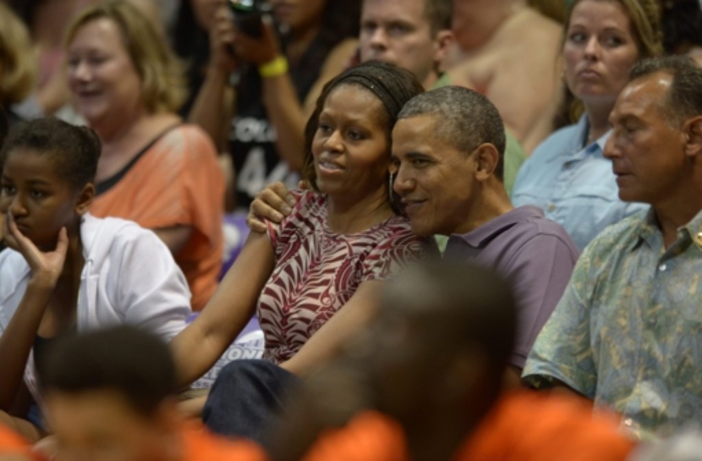 Barack Obama und seine Frau Michelle sind Basketball-Fans.