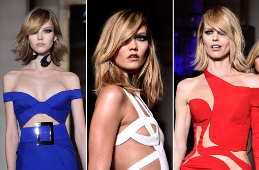 Donatella Versace schickte Karlie Kloss (Mitte) und Eva Herzigova (rechts) bei den Pariser Haute-Couture-Schauen in den Farben der Trikolore über den Laufsteg. Foto: Getty Images
