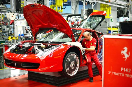 Bei Ferrari setzt man auf Exklusivität. Die Beschäftigten sind stolz auf den Konzern und dessen Autos. Foto: AFP/Gabriel  Bouys