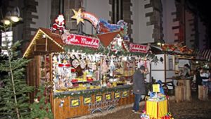Der Süßwarenstand Schmid    und seine Langosch-Kutsche wurden als schönster Stand des Welt-Weihnachtsmarktes prämiert. Foto:  