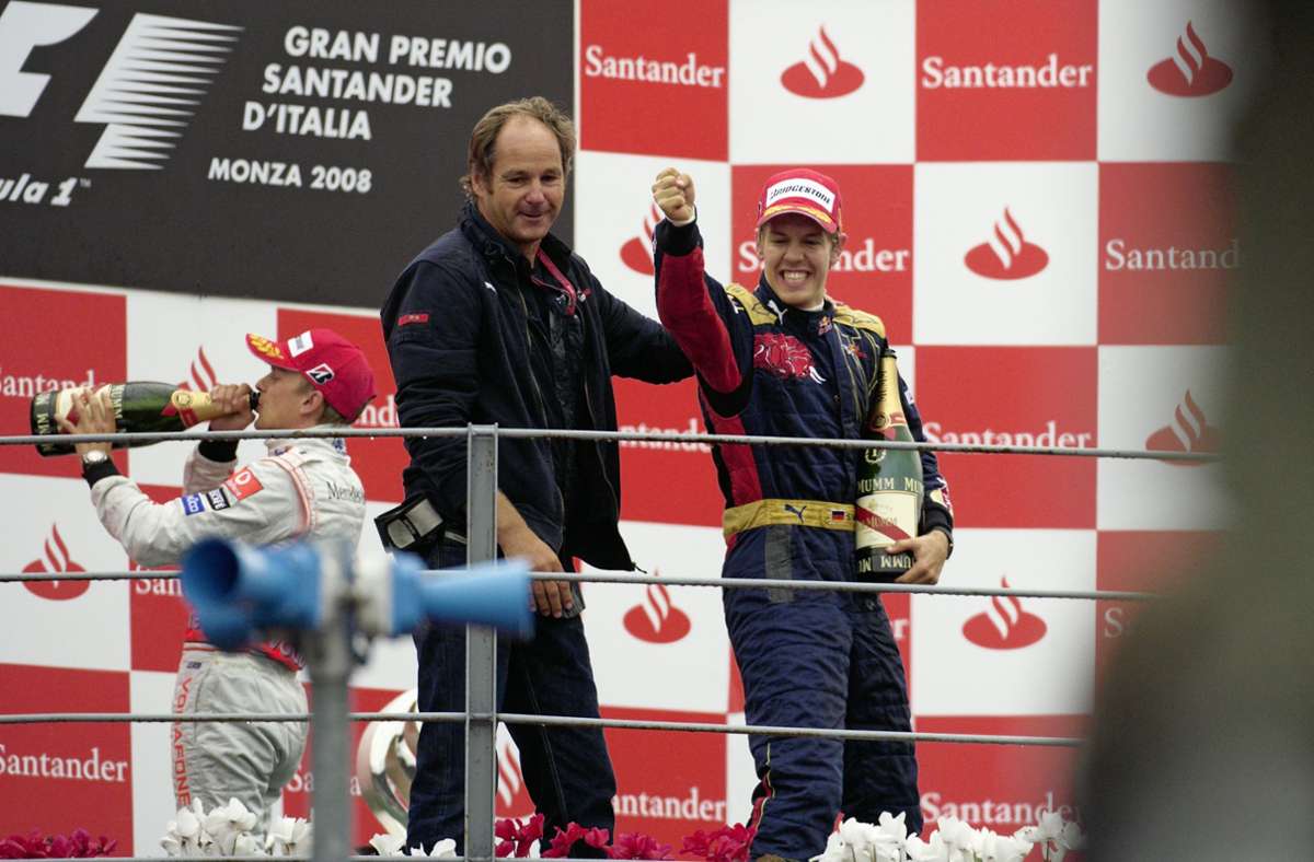 2008: Sebastian Vettel gewinnt im Regen von Monza sein erstes Formel-1-Rennen – als Sensationssieger im Toro Rosso. Teamchef Gerhard Berger feiert mit ihm.