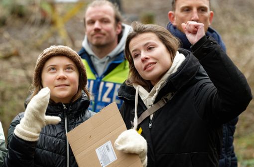 Greta Thunberg (links) beteiligt sich an den Protesten in Lützerath. Foto: dpa/Henning Kaiser