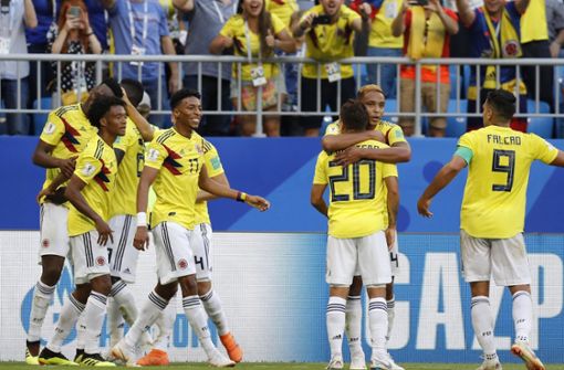 Während die kolumbianische Mannschaft das WM-Spiel gegen Senegal gewinnen konnte, sind zwei Fußball-Fans in Kolumbien an einem Herzinfarkt gestorben. Foto: AP