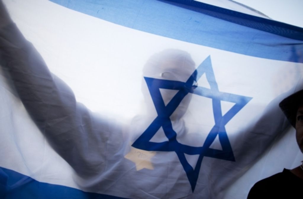 Seit 1948 ist der Davidstern das Emblem der Nationalflagge des neu gegründeten Staates Israel – in Deutschland nutzen Neonazis das sechszackige Symbol zu Boykott-Aufrufen. Foto: Getty