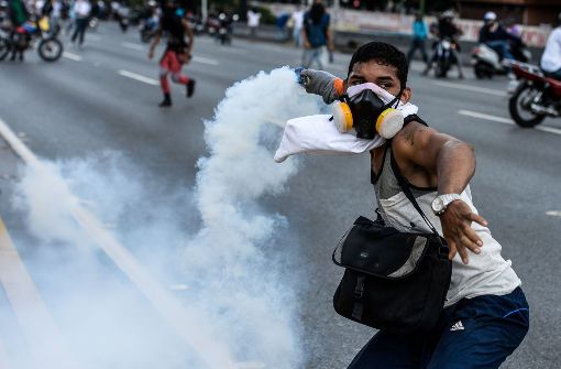 Auf den Straßen von Caracas bringen Demonstranten ihre Wut auf Nicolás Maduro, den Präsidenten Venezuelas zum Ausdruck. Foto: AFP