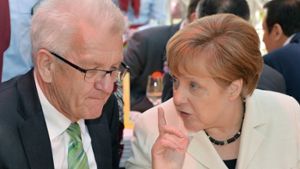 Angela Merkel und Winfried Kretschmann treffen sich immer wieder. Nicht immer wird das für so selbstverständlich gehalten, wie hier bei der Stallwächterparty in Berlin Foto: dpa