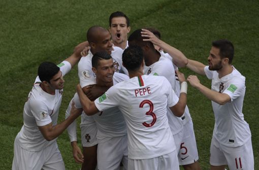 Beim Torjubel achten nicht nur die Portugiesen um Cristiano Ronaldo auf ein winziges Detail. Foto: AFP
