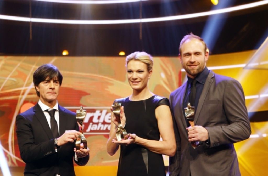 Auszeichnung: Joachim Löw, Maria Höfl-Riesch, Robert Harting (v. li.) Foto: Baumann