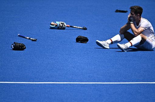 Enttäuschung bei den deutschen Hockey-Herren nach dem verlorenen Spiel um Bronze bei Olympia in Tokio. Foto: AFP/Anne-Christine Poujoulat