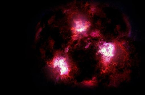 So könnte sie aussehen: Die Galaxie 3MM-1 aus der ersten Zeit nach dem Urknall   ist von extremer Masse und immer noch aktiv. Da sie hinter galaktischen Staubwolken verhüllt ist, konnte sie erst jetzt von Teleskopen aufgespürt werden. Foto:  