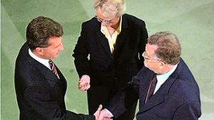 Historischer Moment im Dezember 2004: Erwin Teufel und Annette Schavan gratulieren Günther Oettinger zu seinem Sieg bei der Mitgliederbefragung Foto: dpa
