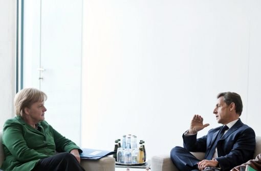 Bundeskanzlerin Angela Merkel und der französische Staatspräsident Nicolas Sarkozy. Foto: Bundesregierung-POOL