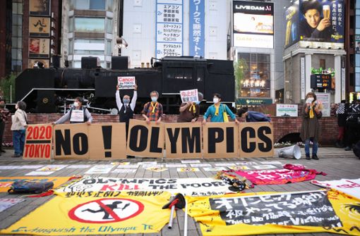 Viele Japaner wollen nicht, dass die Olympischen Sommerspiele vom 23. Juli an in Tokio stattfinden. Foto: dpa/Stanislav Kogiku