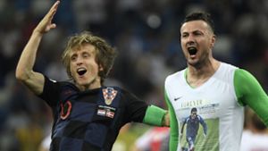 Luka Modric (links) und Danijel Subasic nach dem Sieg gegen Dänemark. Foto: xinhua