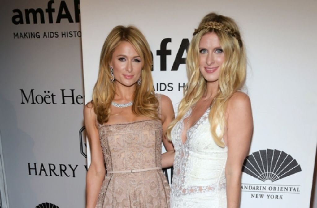 Paris Hilton (l.) und ihre Schwester Nicky Hilton Rothschild bei der amfAR-Gala 2016 in New York.