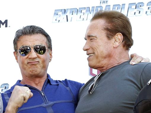 Inzwischen ziemlich beste Action-Freunde: Sylvester Stallone (li.) und Arnold Schwarzenegger. Foto: imago/PicturePerfect International