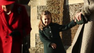 Sie erinnert viele an ihre Urgroßmutter: Prinzessin Charlotte, die Tochter von Prinz William und Herzogin Kate. Foto: Jon Super/AP/dpa