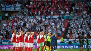 Das Spiel zwischen Dänemark und Finnland wurde unterbrochen. Foto: dpa/Stuart Franklin