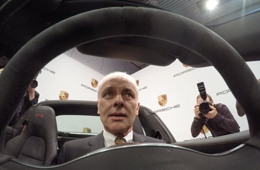 Porsche-Chef Matthias Müller lenkt das Unternehmen mit Erfolg Foto: dpa