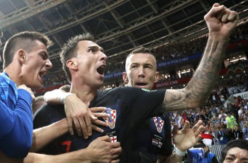 Mario Mandzukic (Mi.) steht mit Kroatien im Finale der WM 2018. Foto: AP