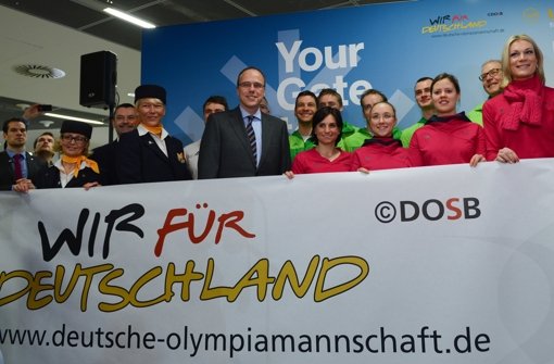 Wir für Deutschland - die deutschen Athleten sind nun von Frankfurt aus nach Sotschi geflogen. Foto: dpa