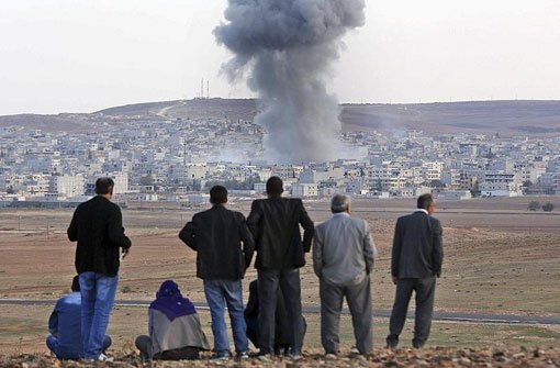 Die Grenzstadt Kobane wird seit Wochen hart umkämpft. (Archivfoto) Foto: dpa
