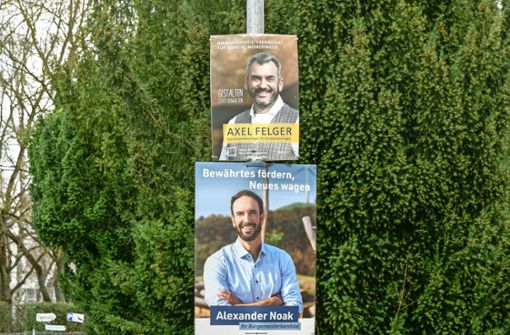 In Korntal-Münchingen hängen mittlerweile viele Plakate der Bürgermeisterkandidaten. Foto: Simon / Granville
