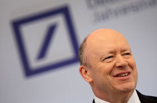 Bei der Vorstellung der Jahresbilanz der Deutschen Bank konnte John Cryan noch lachen. Foto: AFP