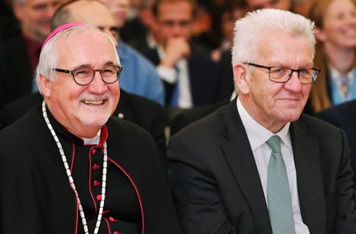 Bischof Gebhard Fürst (li.) und der baden-württembergische Ministerpräsident Winfried Kretschmann kennen sich gut. (Symbolbild) Foto: imago//Markus Ulmer