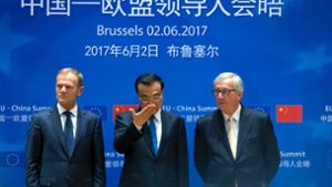 EU-Ratspräsident Donald Tusk (links), der chinesische Premierminister Li Keqiang und der Präsident der Europäischen Kommission, Jean-Claude Juncker, am Freitag in Brüssel. Foto: POOL