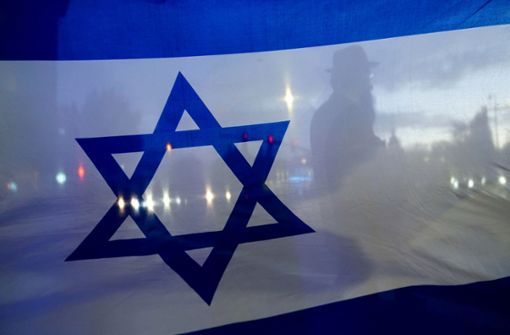 Nicht nur bei Demonstrationen sieht man derzeit die israelische Flagge. Auch viele Städte haben sie gehisst. Foto: dpa/Lindsey Wasson