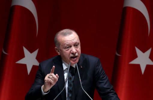 Recep Tayyip Erdogan forderte gegenüber Angela Merkel eine „Lastenteilung“ in der Flüchtlingskrise. Foto: AFP/ADEM ALTAN