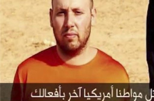 Mord  als IS-Propaganda: Der US-Journalist Steven Sotloff in einem Video der Terrormilizkurz vor seiner Enthauptung Foto: ISLAMIC STATE