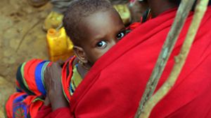 Schutz bei der Mutter: ein Flüchtlingslager in Somalia Foto: picture alliance / Maurizio Gamb