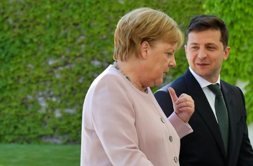 Beim Besuch des neuen ukrainischen Präsidenten hatte Angela Merkel einen Zitteranfall. Foto: AFP