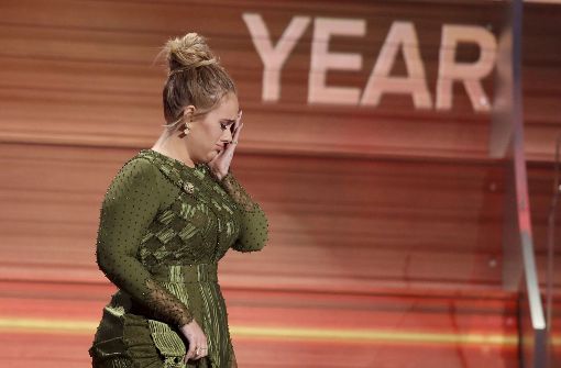 Adele muss ihre Tournee abbrechen und ist am Boden zerstört. Foto: Invision/AP