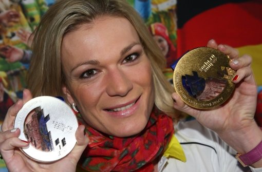 Gold in der Abfahrt, Silber im Super-G: Maria Höfl-Riesch erlebt glänzende Olympische Spiele Foto: dpa
